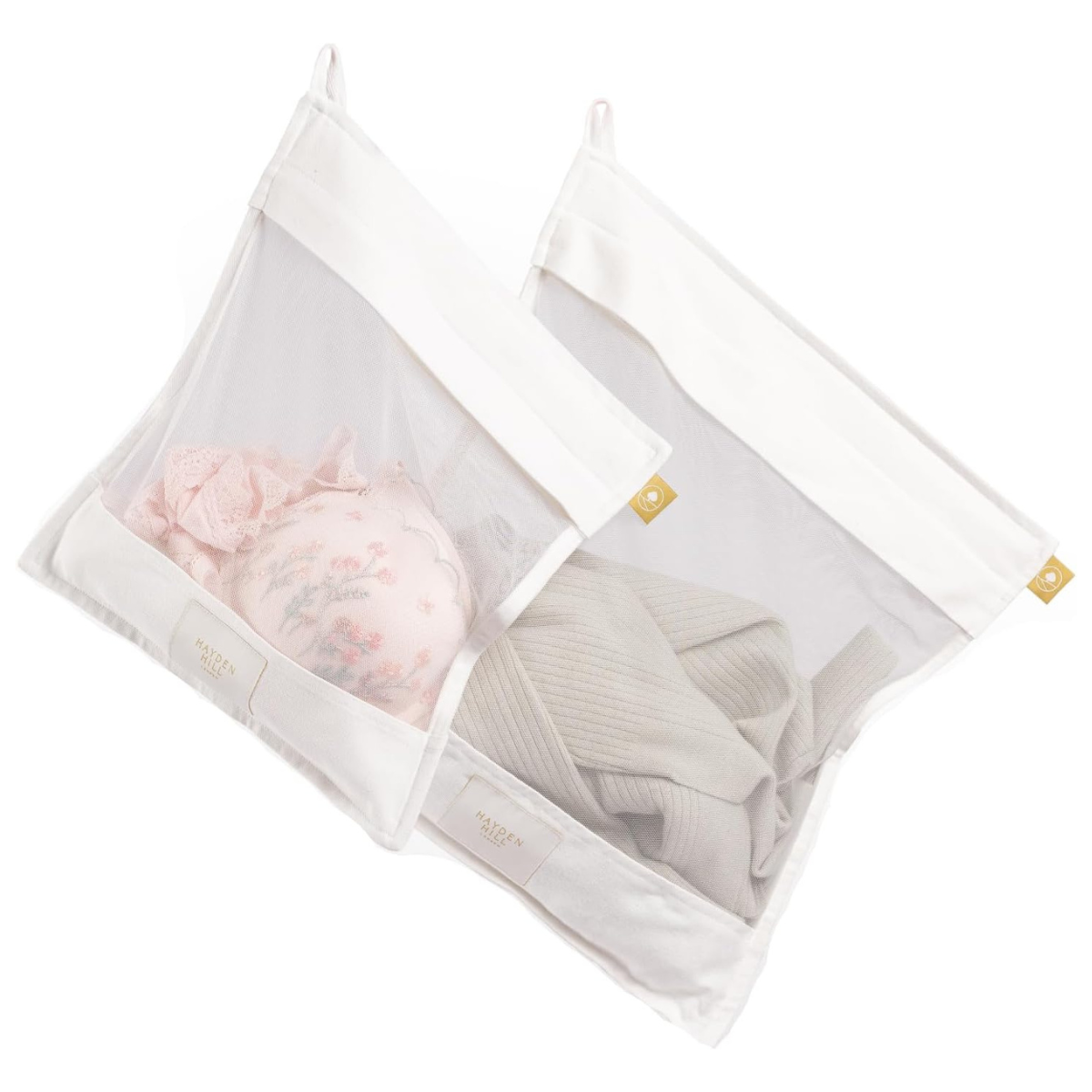 white and mesh cotton drying bags with laundry inside