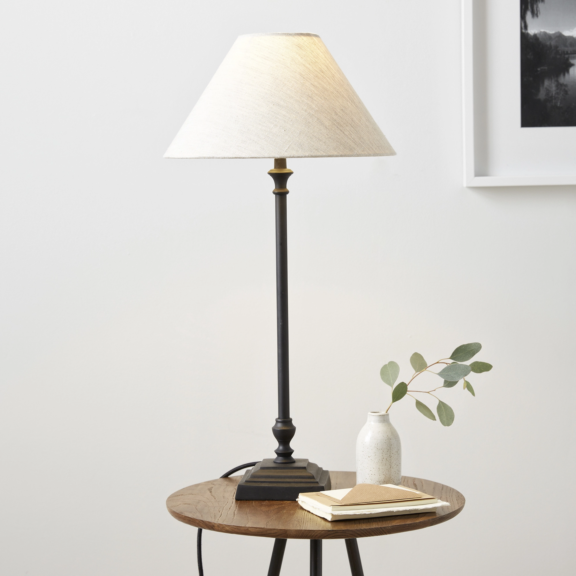 black lamp with white shade