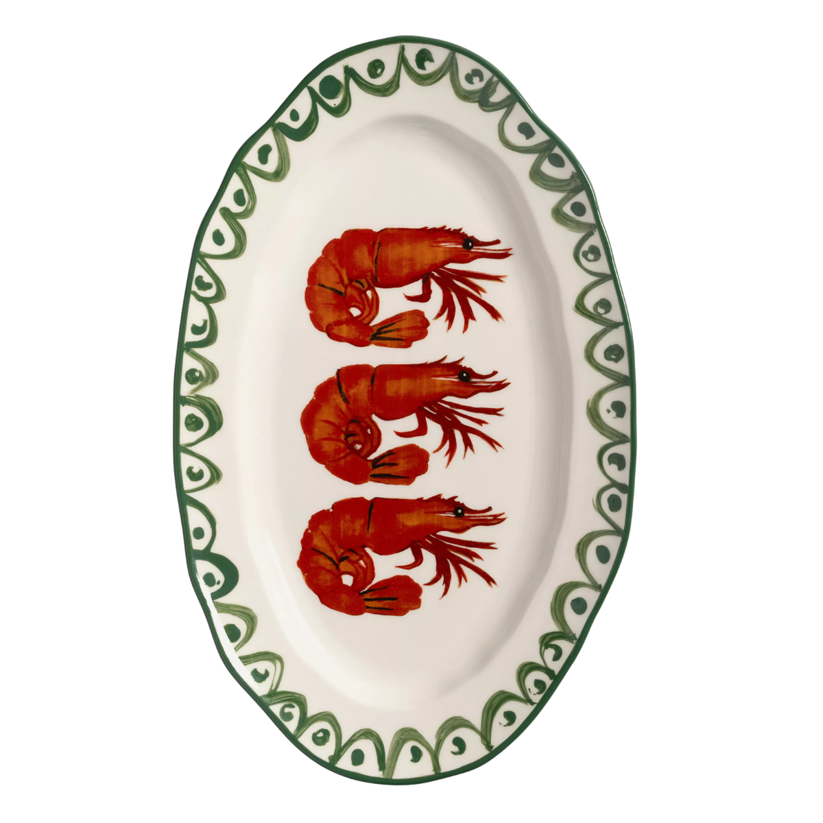 an oval serving plate with a patterned green border and three red shrimps in the middle