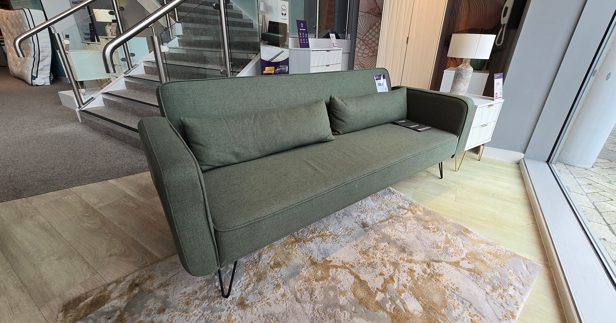 Bensons for Beds Eleanor Sofa Bed pictured in a living room setting in khaki colour