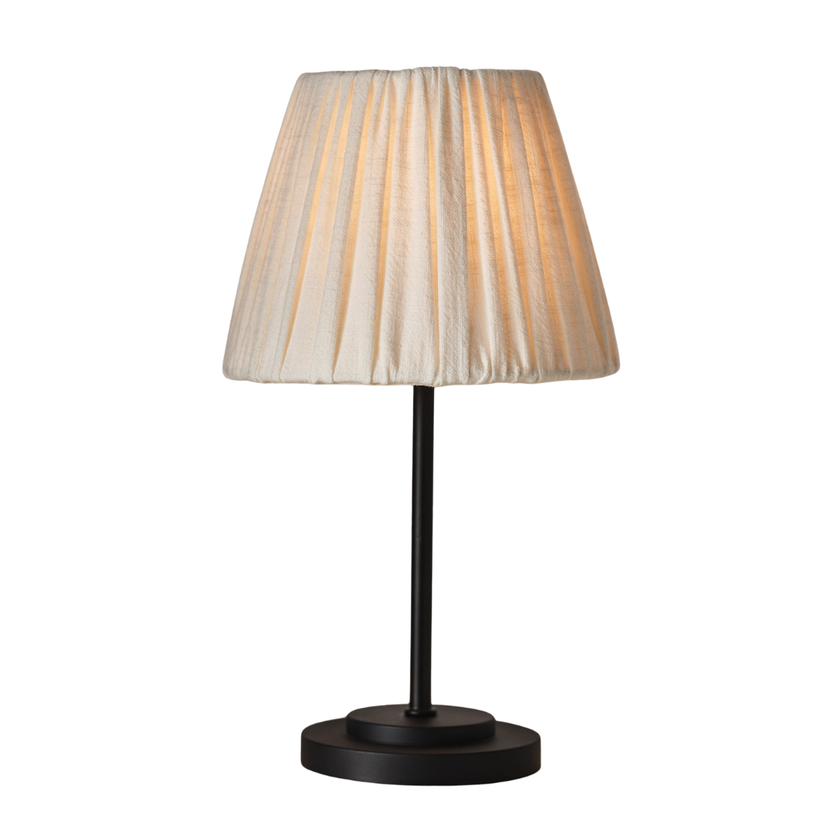a lamp with a cream pleated shade and a black base