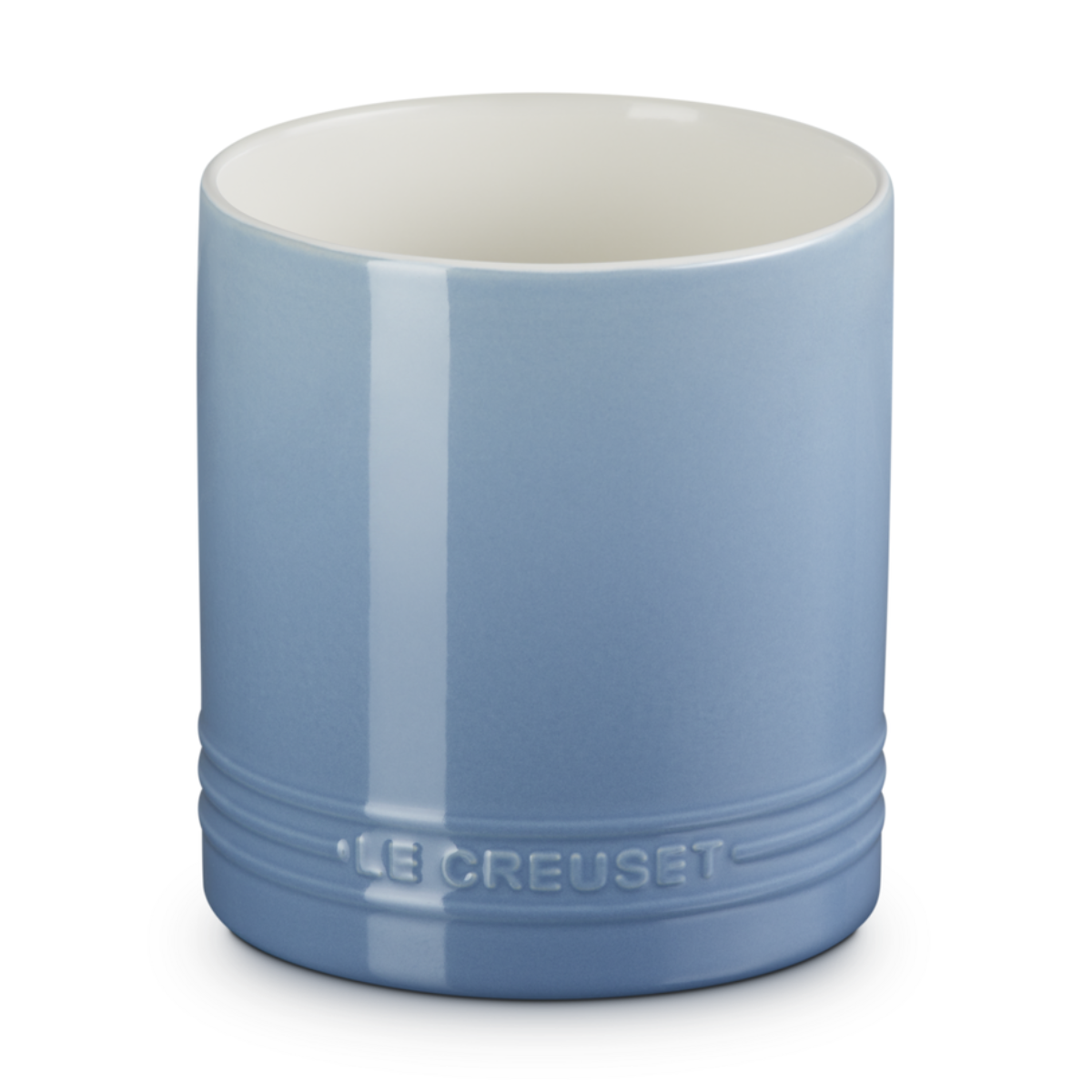 a blue stoneware utensil jar