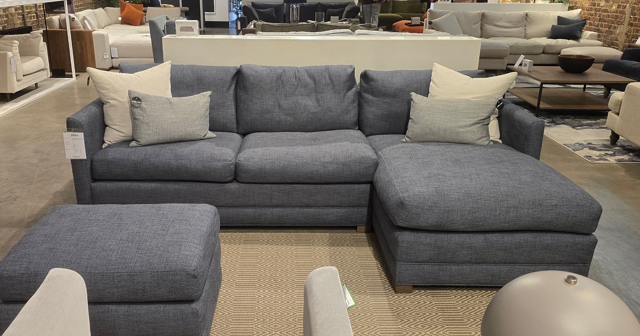 Sofa.com Aissa 2.5-Seat Chaise Sofa Bed pictured in grey colour in a living room setting