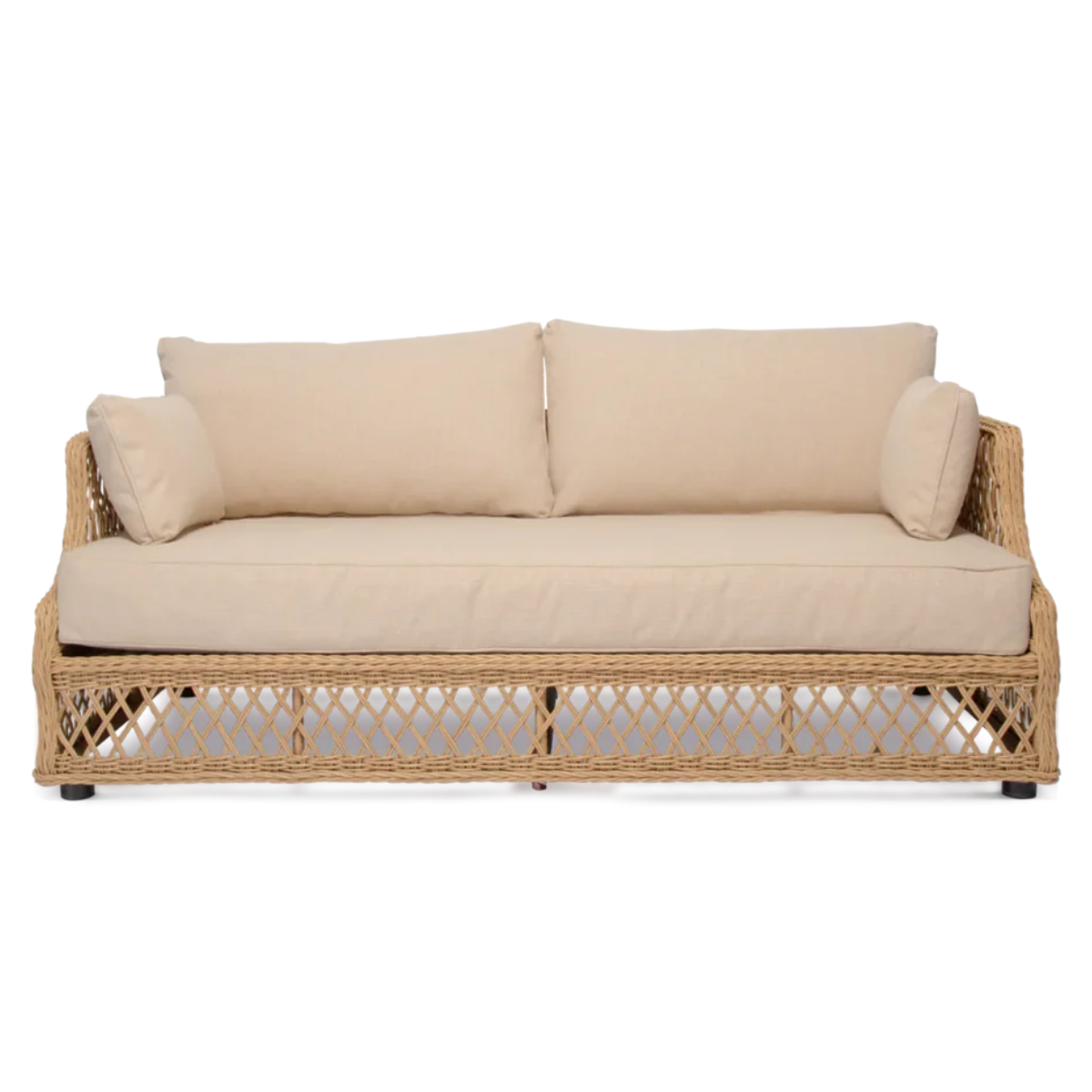 a rattan garden sofa with cream cushions