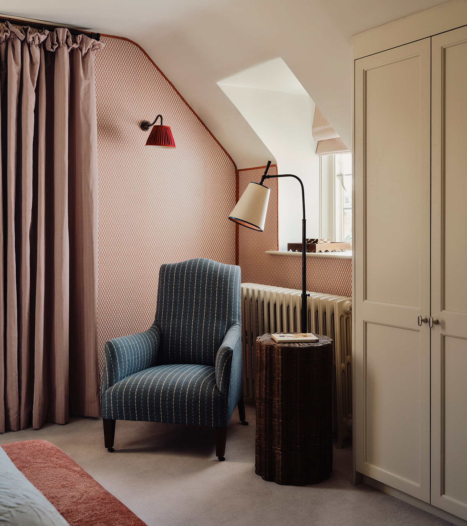 cosy corner in bedroom with a chair and table