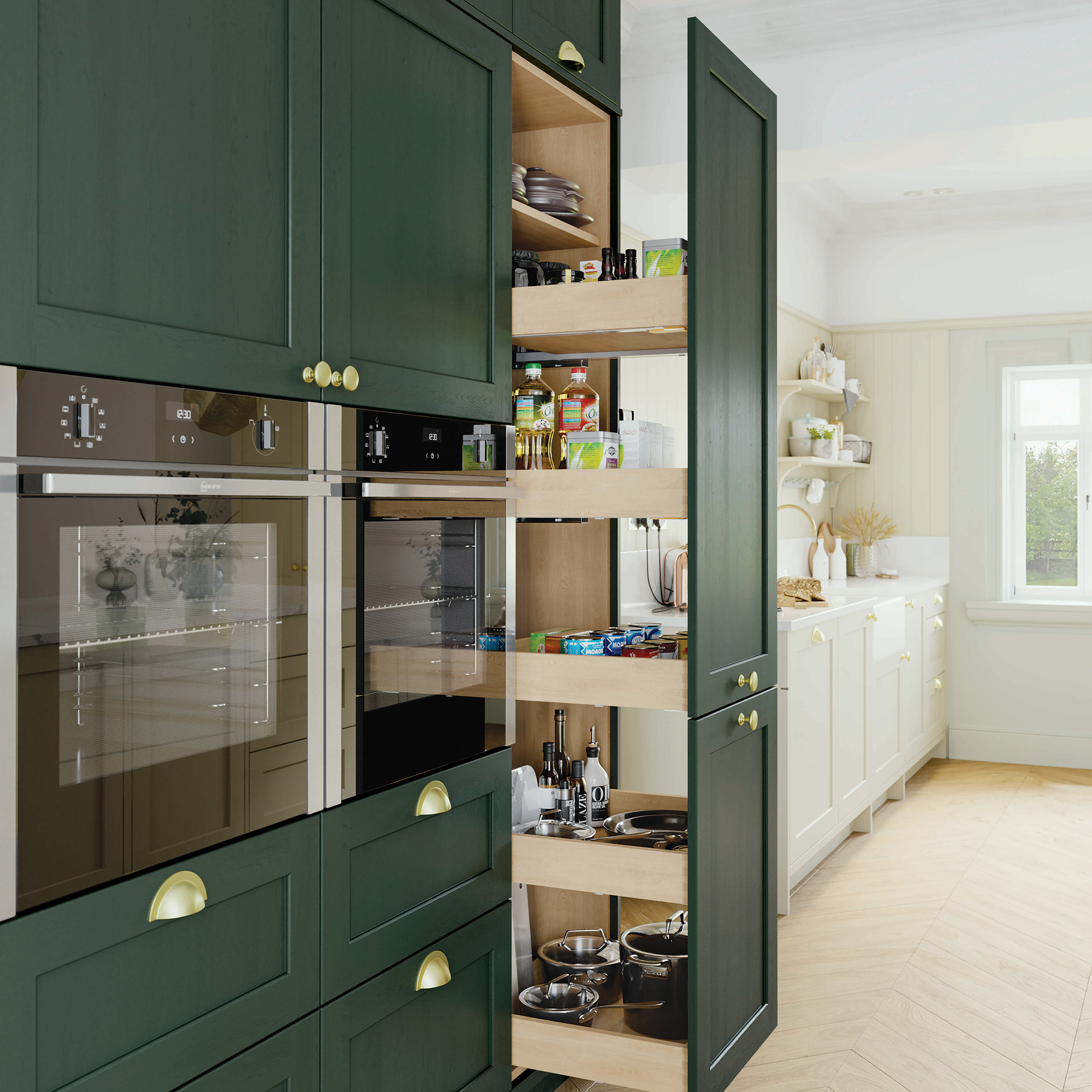 dark green kitchen cupboards with pull out larder