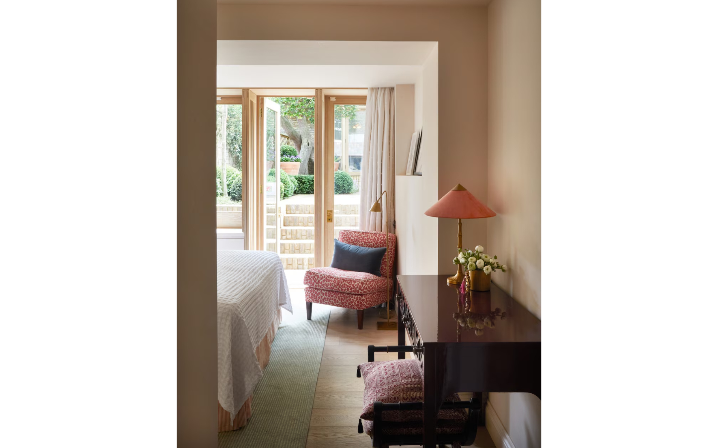 photo of bedroom with glass doors to garden, Interior design by Hutley & Humm