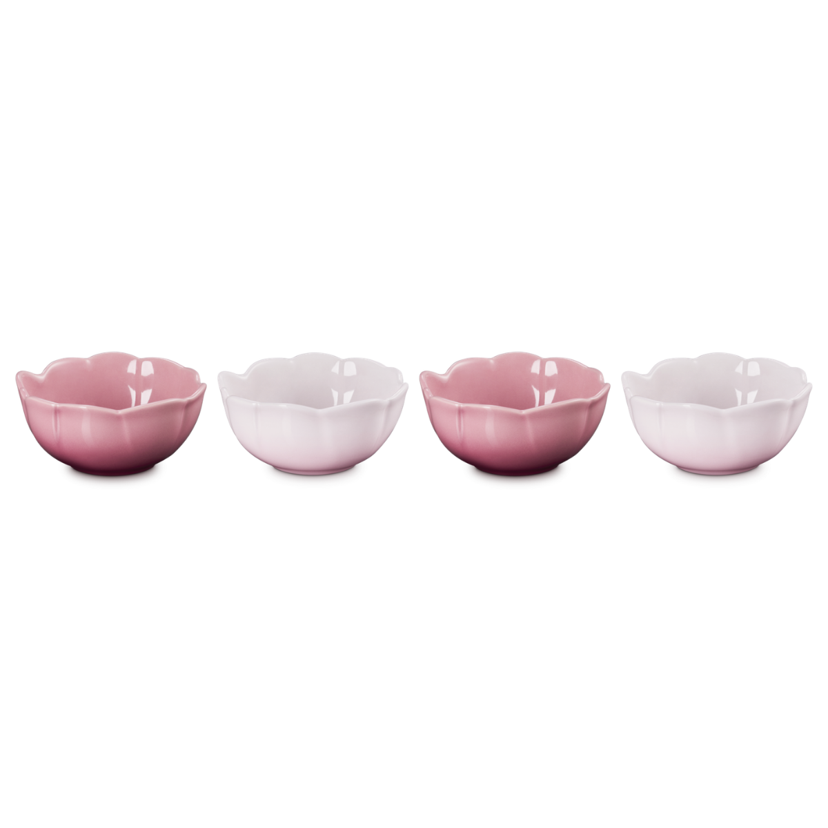 a set of 4 petal shaped bowls in pink and light pink