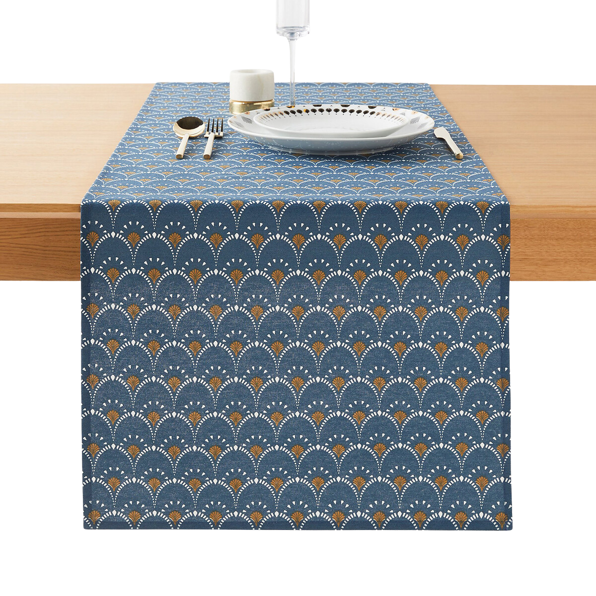 a dark navy table runner with a white and brown pattern