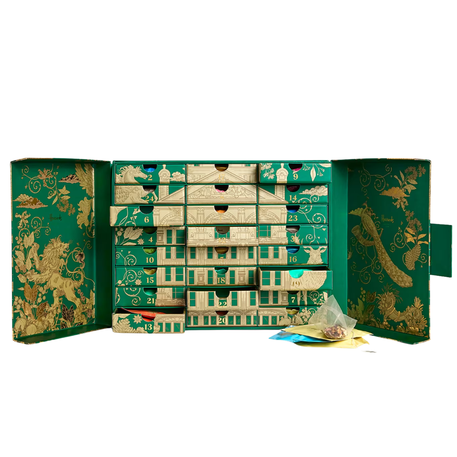 Harrods tea advent calendar in green and gold, with open drawers revealing individually wrapped tea sachets