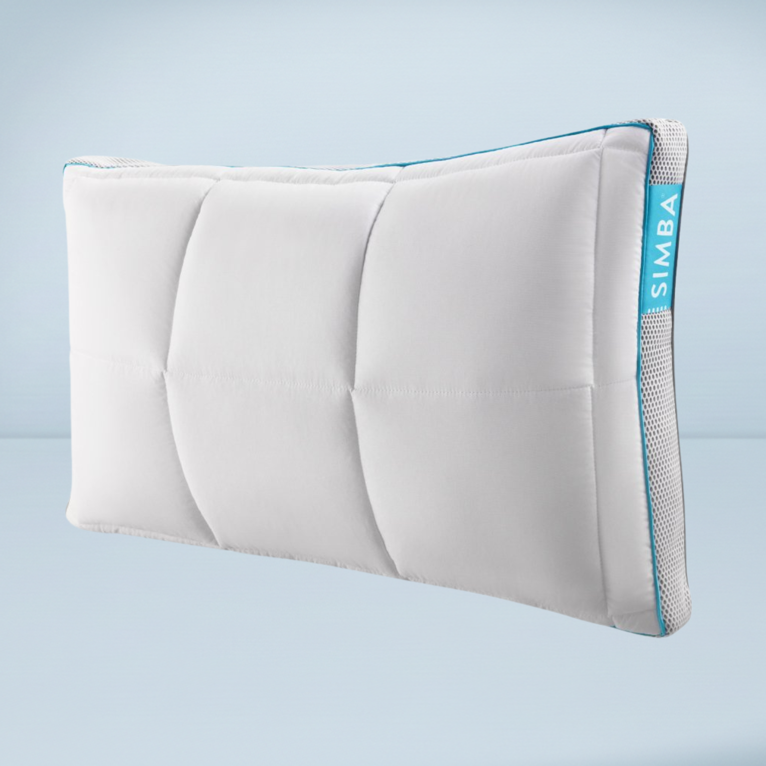 a white simba hybrid pillow on a pale blue background