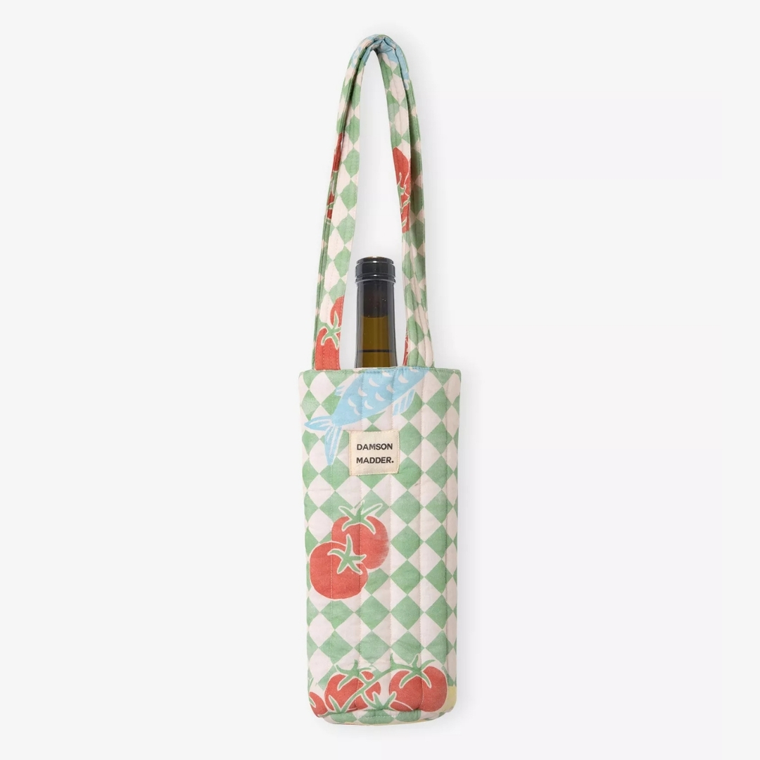 damson madder wine bag pictured wine holder with tomato design on a clear background