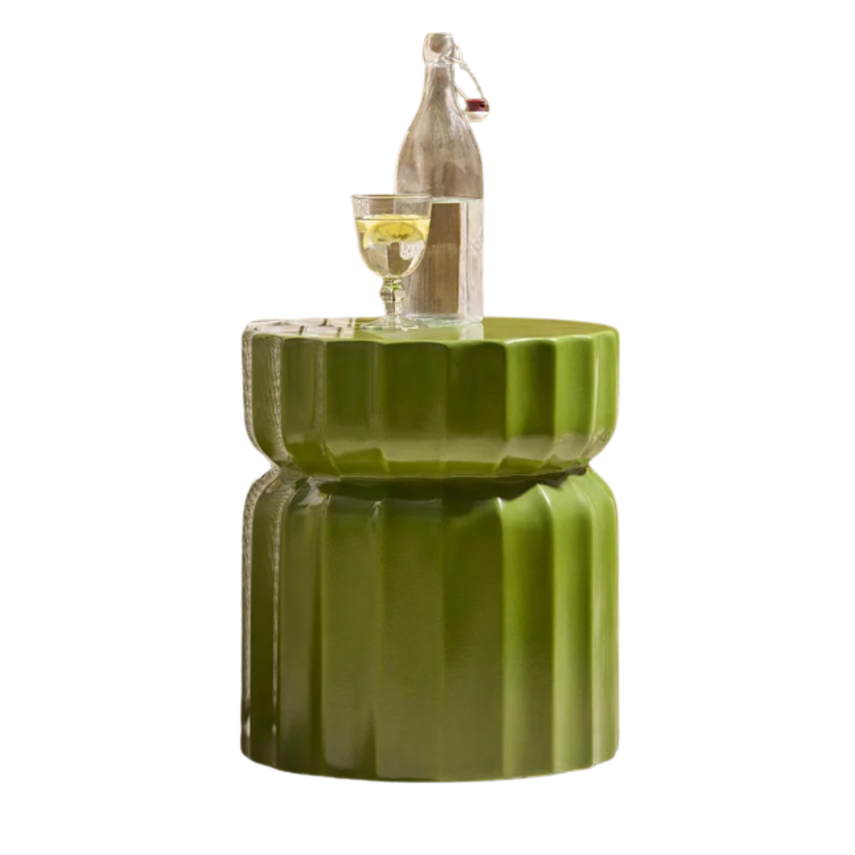 a small lacquer green column style outdoor side table with a bottle and glass of water on top