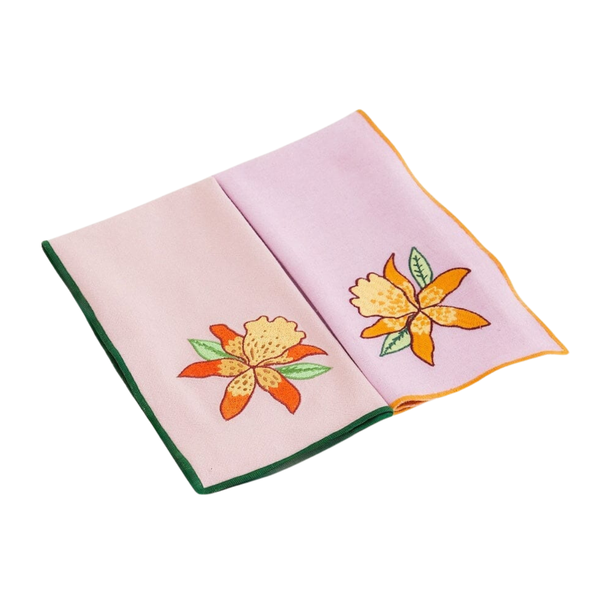 two lilac napkins with a single large brightly coloured embroidered flower on each