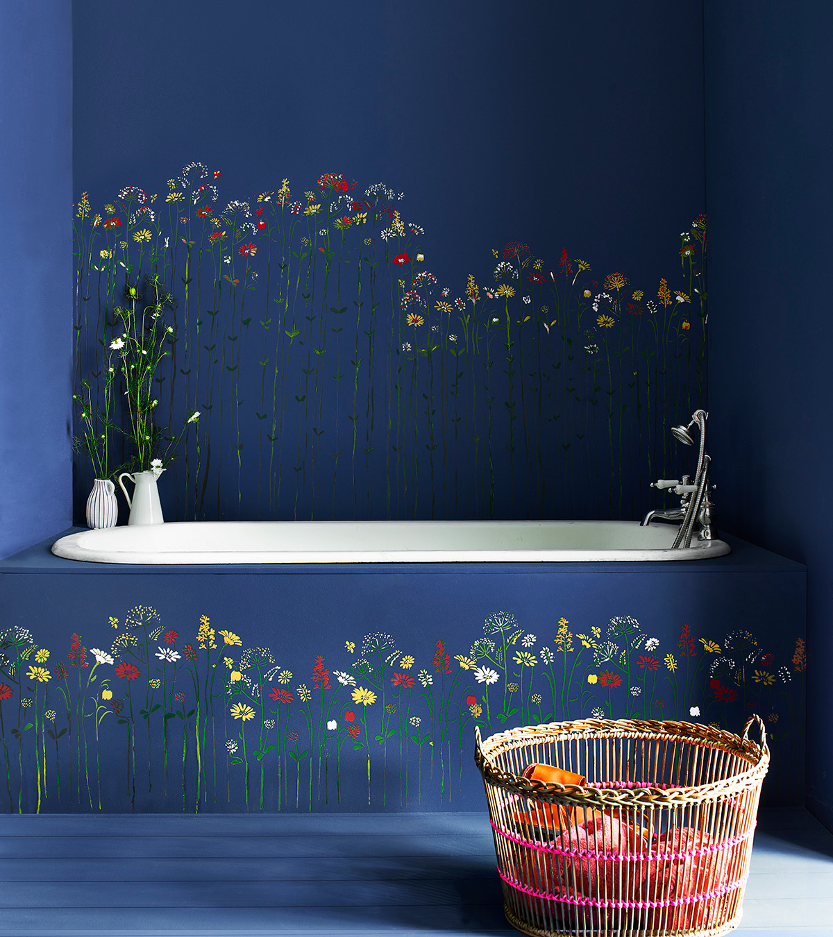 navy blue bathroom with floral mural