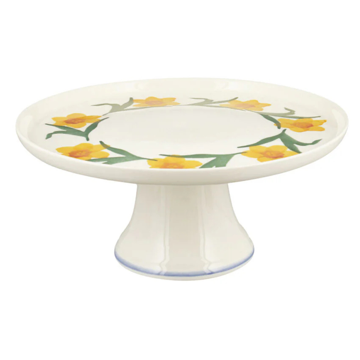 a white ceramic cake stand with painted green and yellow daffodils