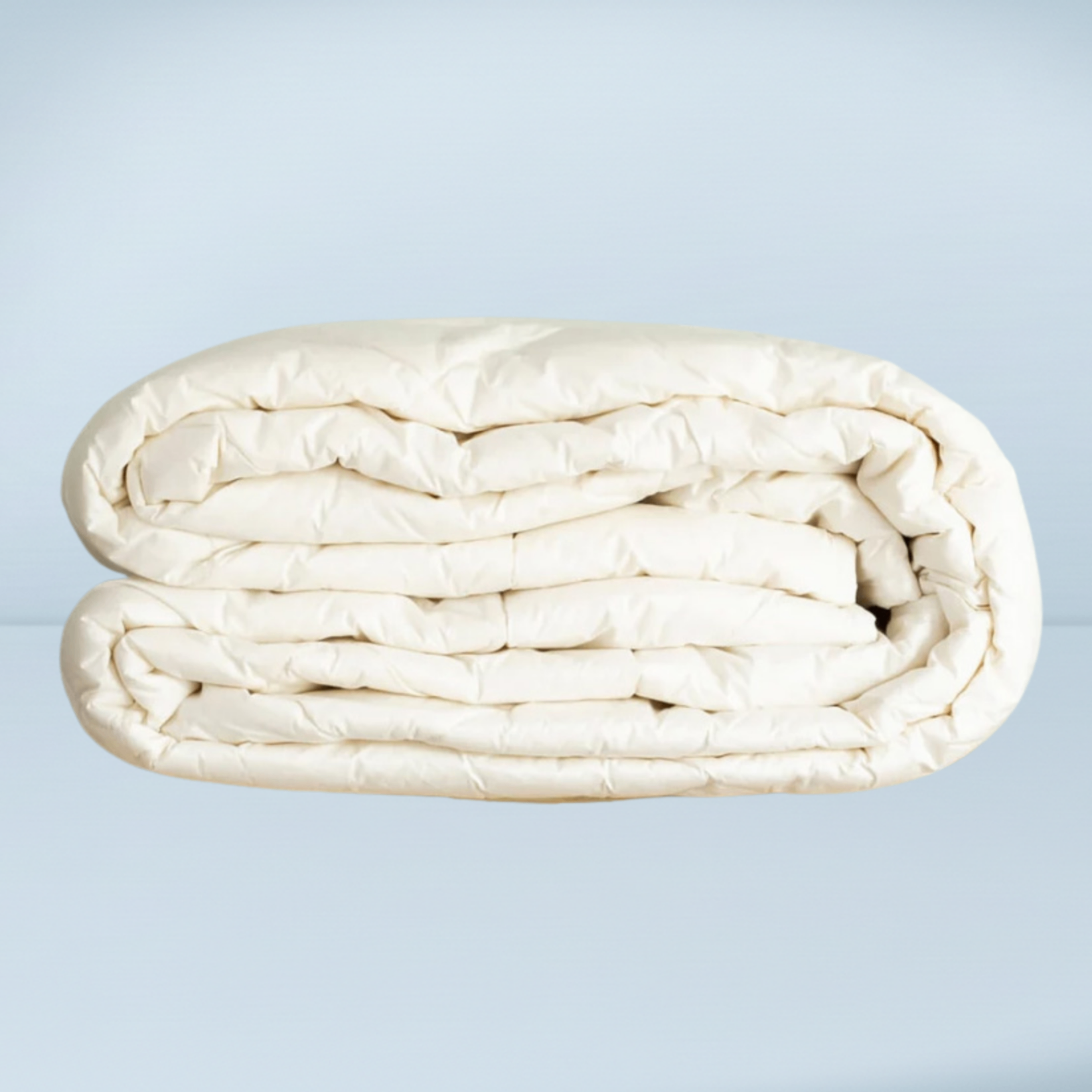 a folded up mattress topper