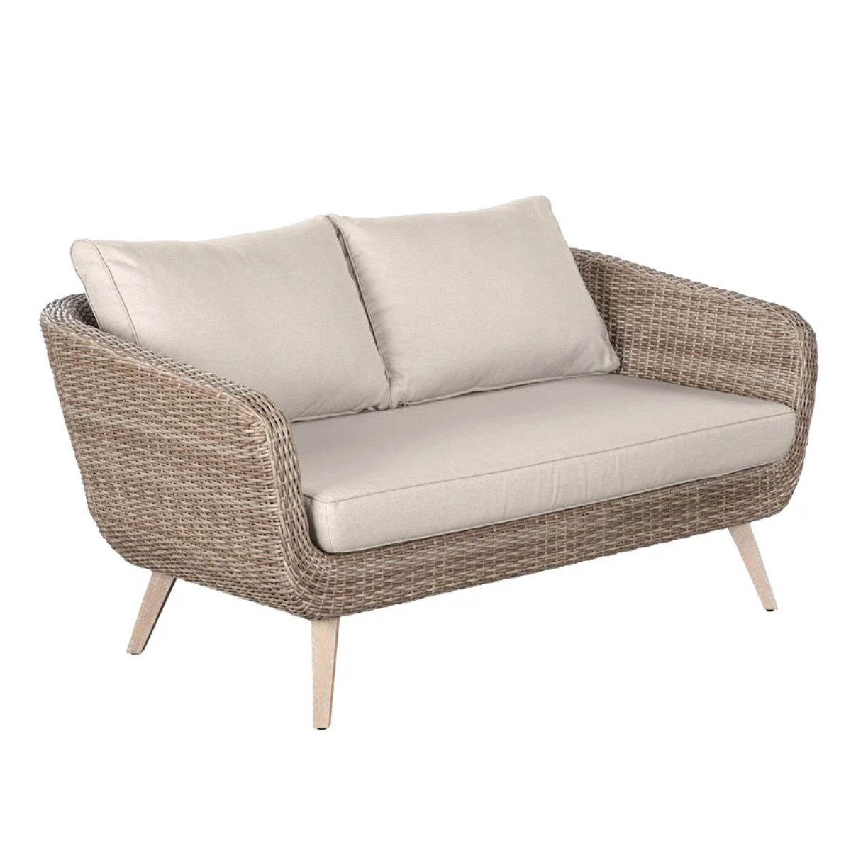 a rattan garden sofa with cream cushions
