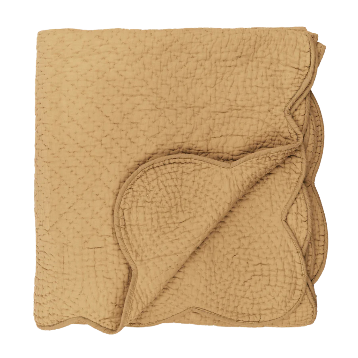 an ochre bedspread with a scalloped trim