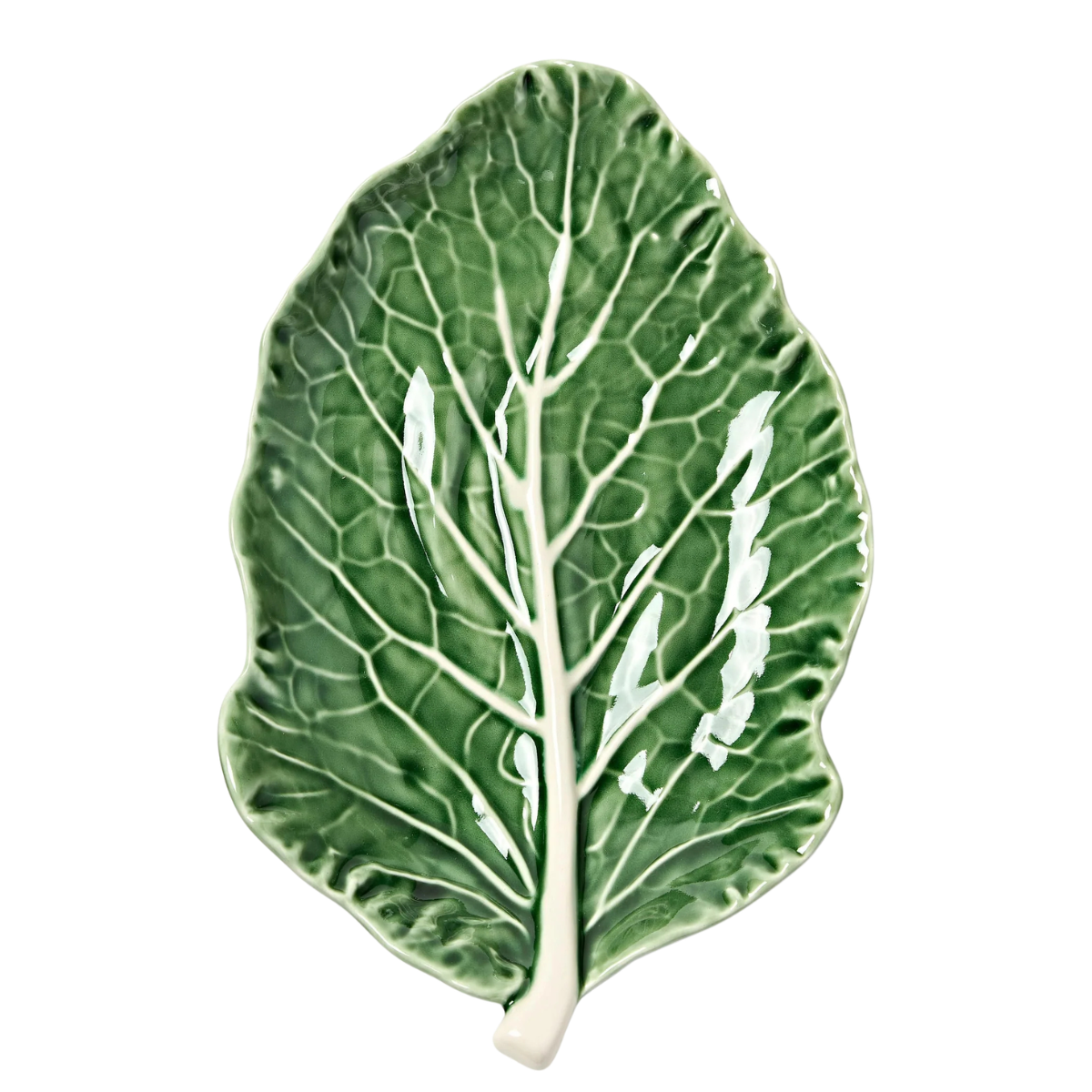 a green serving plate in the shape of a cabbage leaf