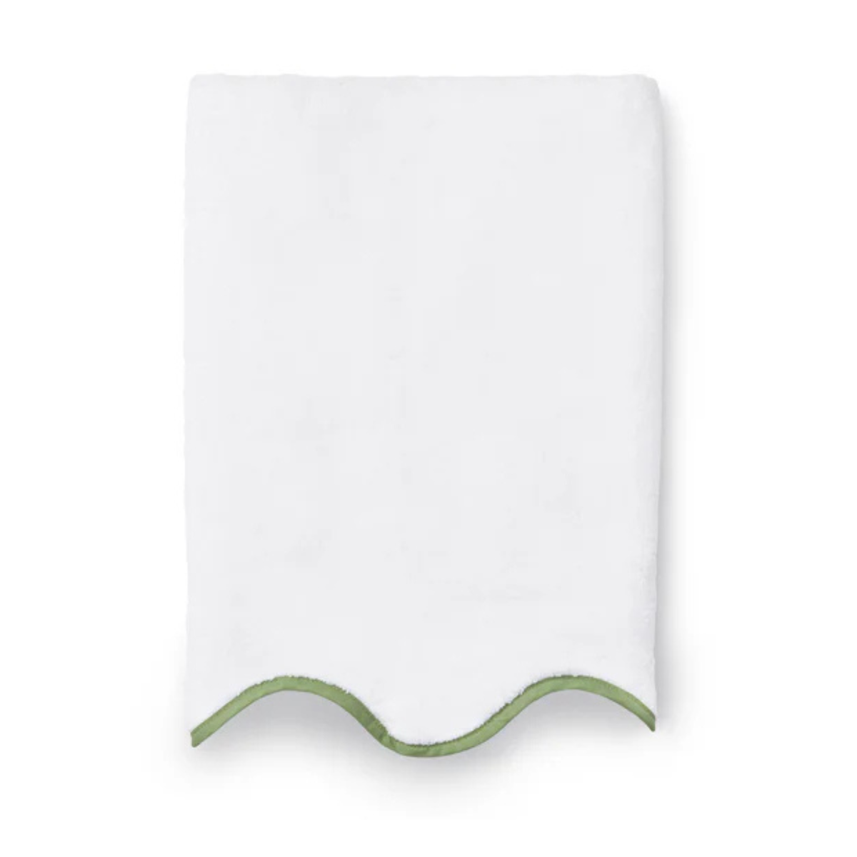a white hand towel with scalloped edge and a green trim