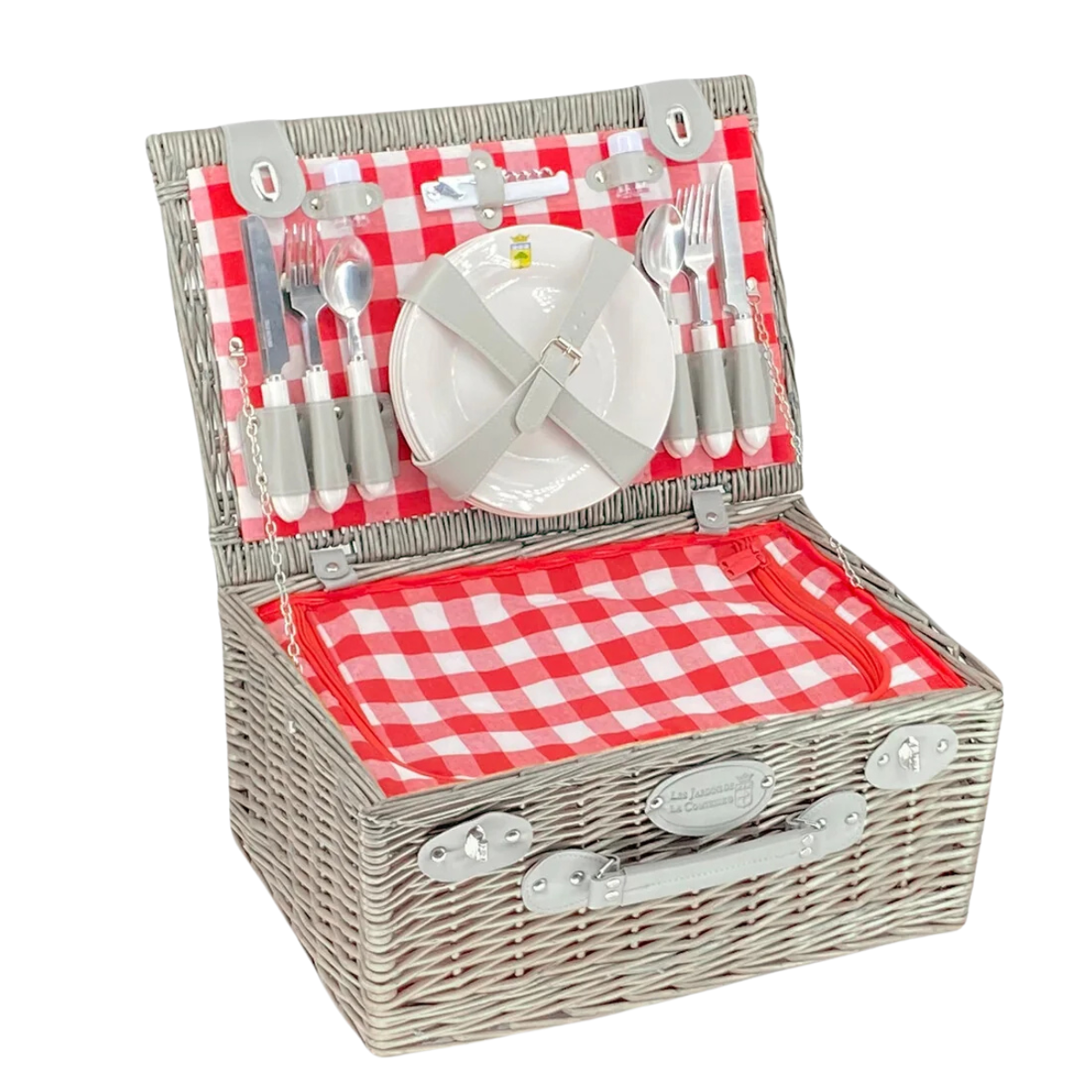 a wicker picnic basket with a red and white gingham interior with plates and cutlery