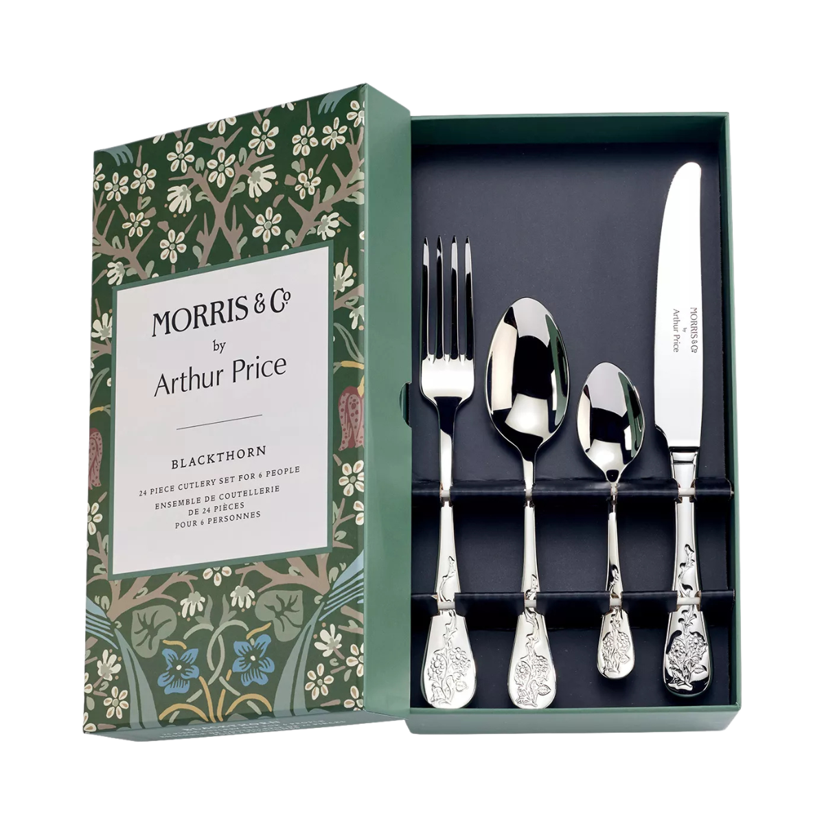 a set of silver cutlery in a cardboard box covered in a green william morris pattern