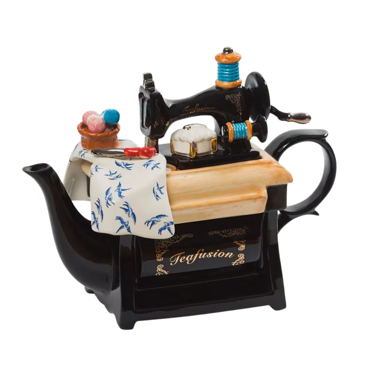 a black tea pot in the shape of a sewing machine