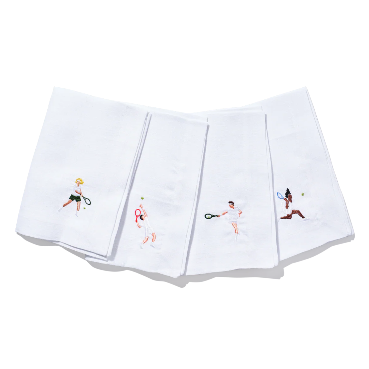 a set of 4 white cocktail napkins with tennis players