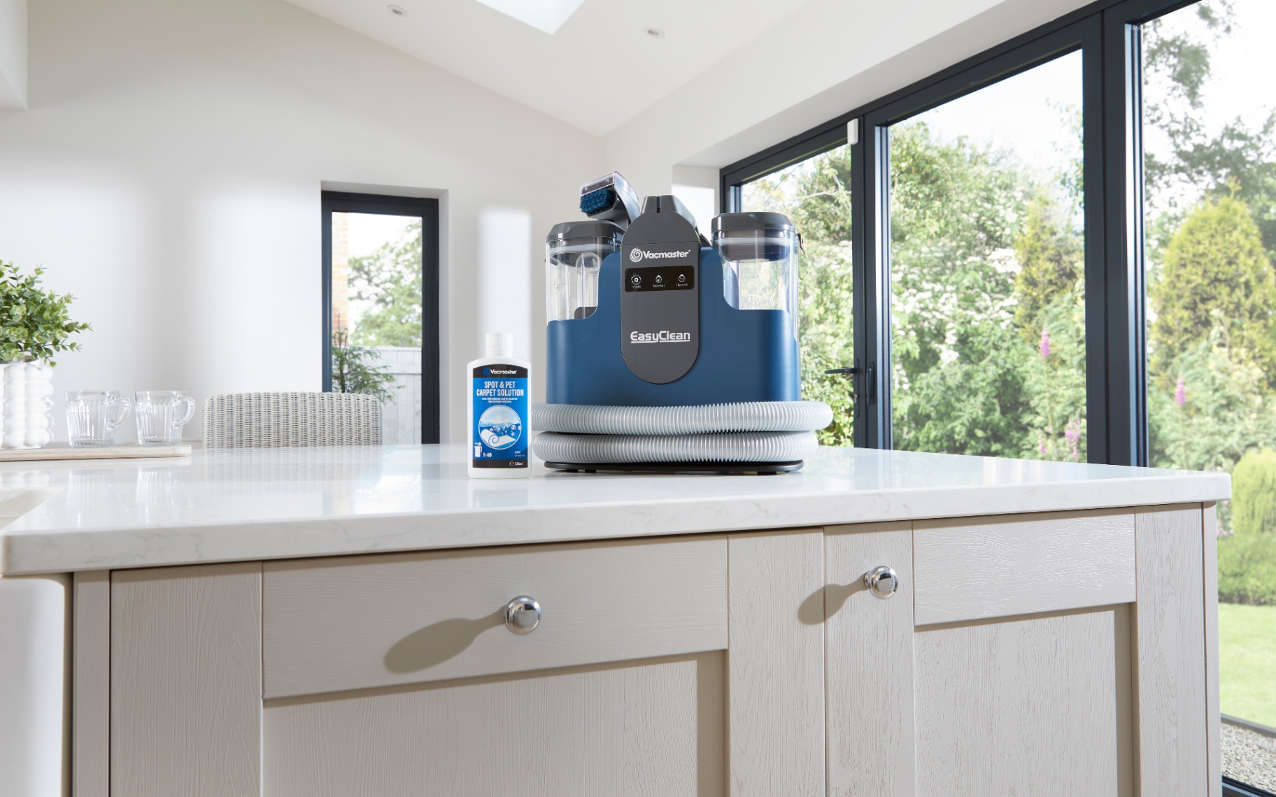 vacmaster spot cleaner on a white kitchen countertop
