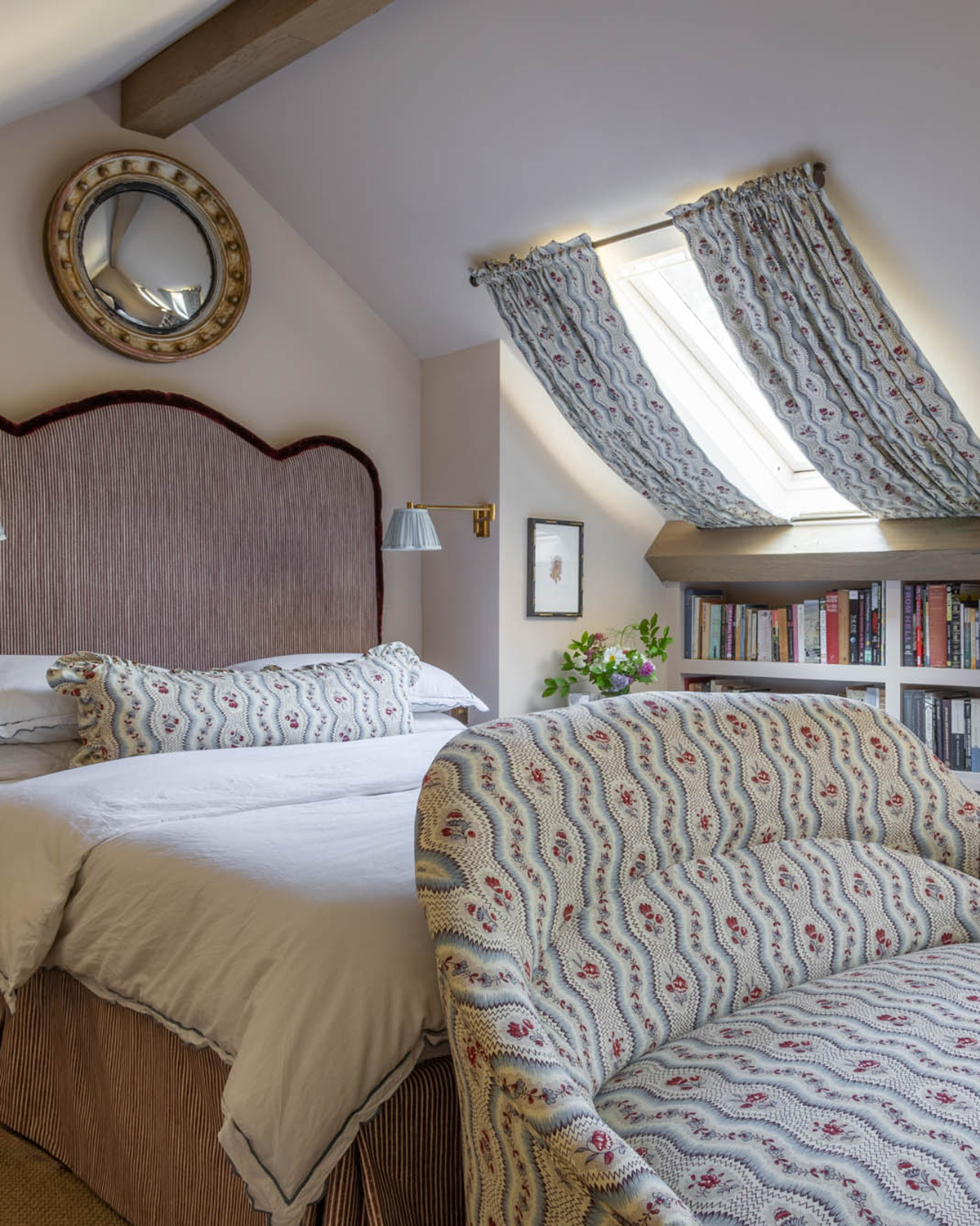 sean symington interior design bedroom with matching floral chintz pillow, chair and ceiling blinds on the window