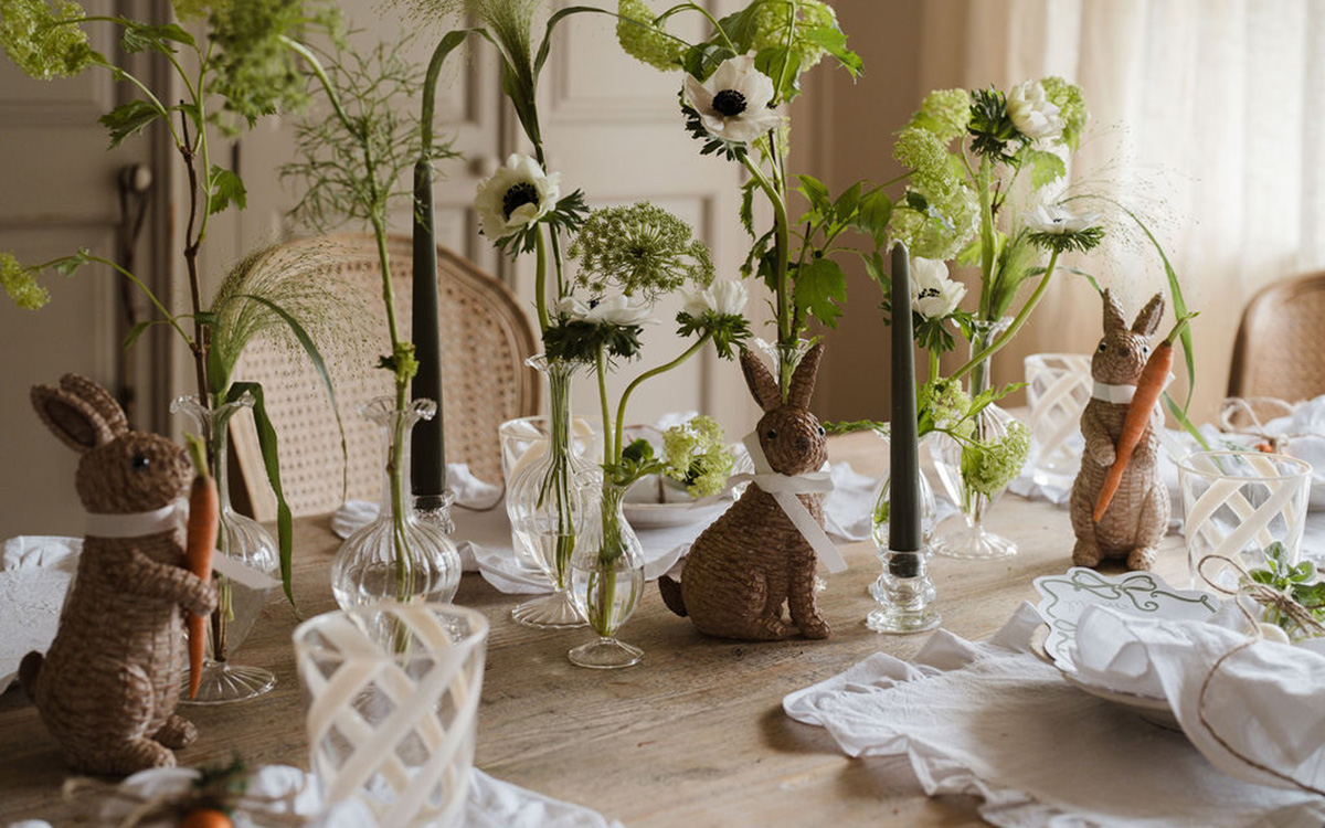 Easter table decorating neautral table with bunnies and flowers