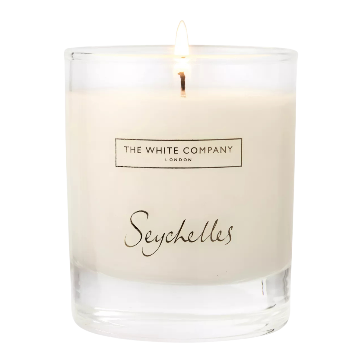 a lit seychelles candle from The White Company