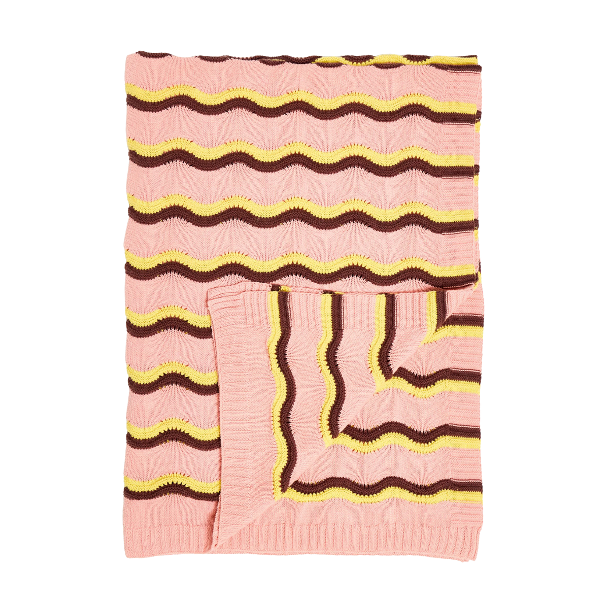 a light pink knitted throw with wavy stripes in yellow and brown