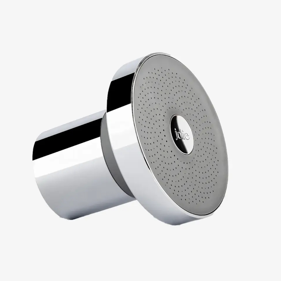 Jolie Skin Co. Filtered Showerhead for hard water pictured on a white background in chrome colour