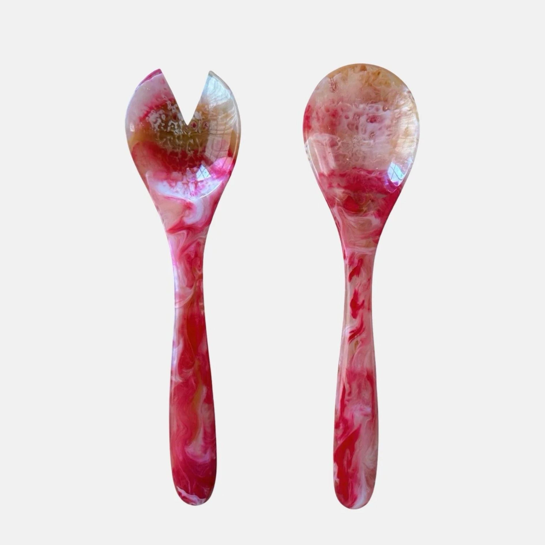 Studio Noticed Pink salad servers pictured tableware on a white background