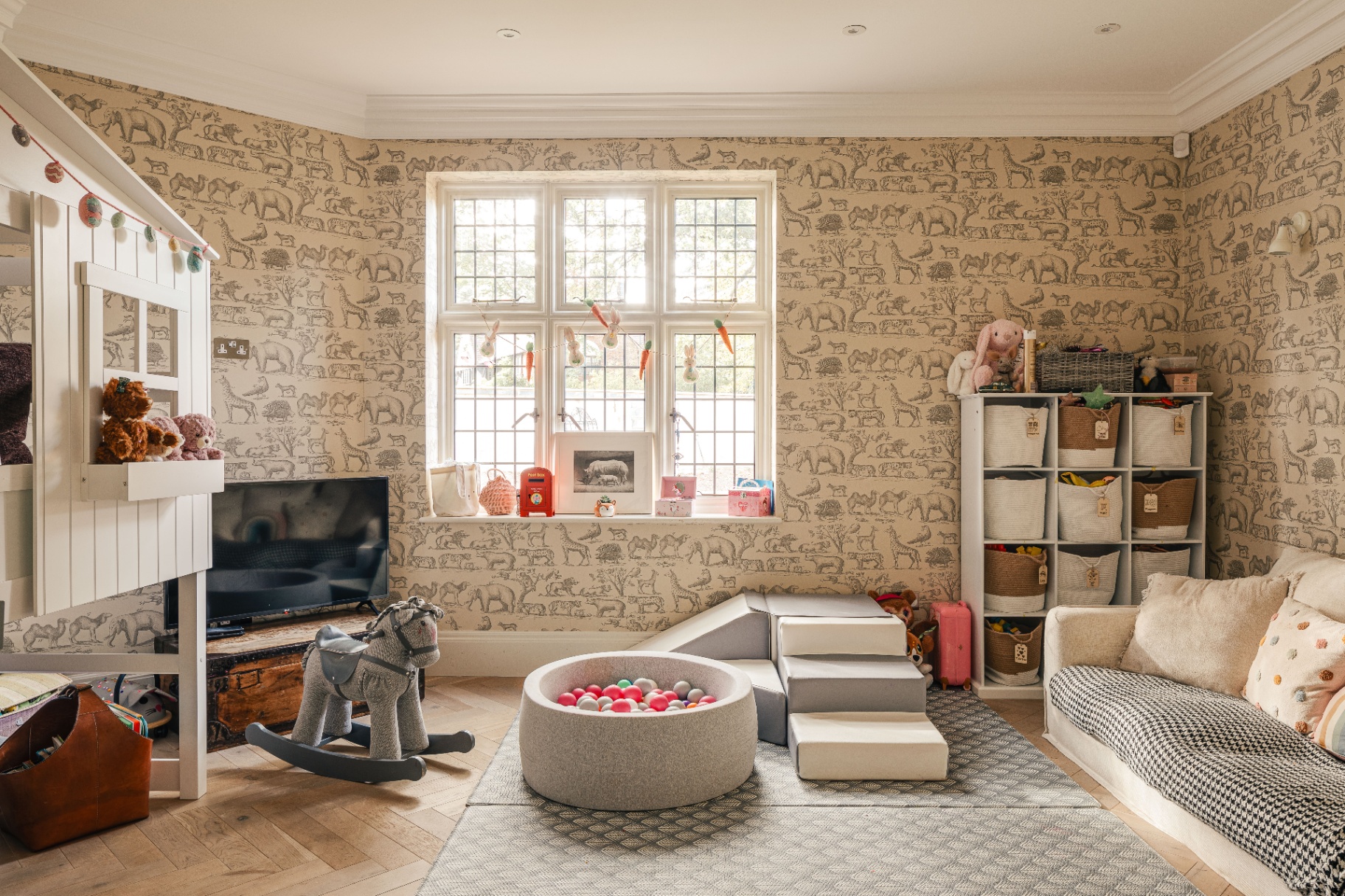 David Gandy house The playroom walls are covered in Andrew Martin’s ‘Ark’ wallpaper with soft furnishings and a children’s indoor treehouse from Noa & Nani