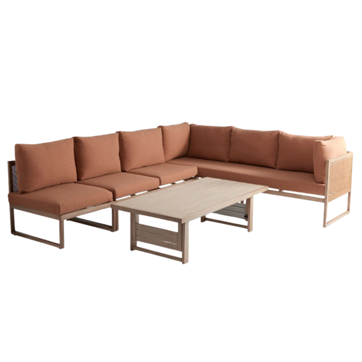 a wood and rattan l shape garden sofa with rust cushions and a small wooden coffee table