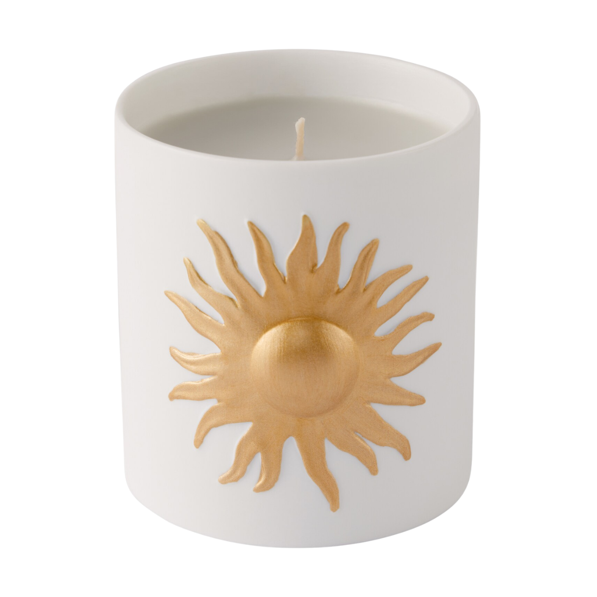 a white ceramic candle with a gold sun
