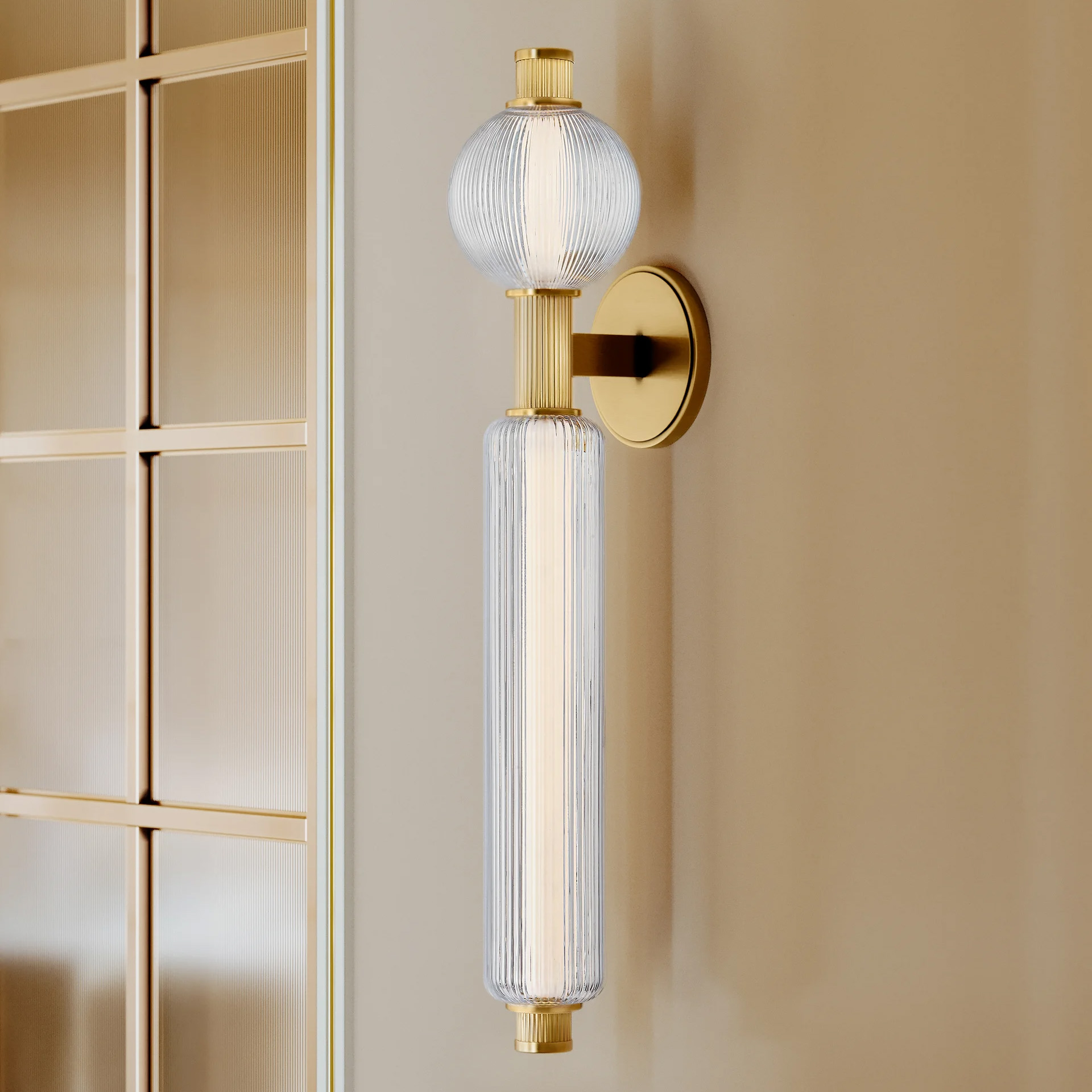 a long mid century sputnik design wall sconce with ribbed glass and gold hardware