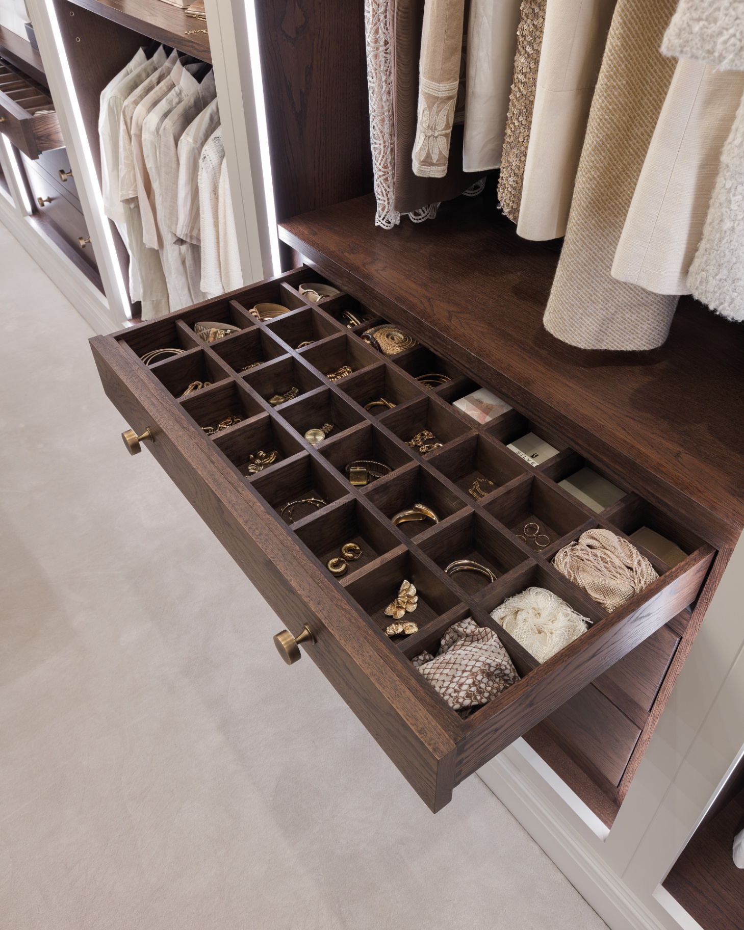 a tom howley bespoke dark wood drawer for jewellery and watches