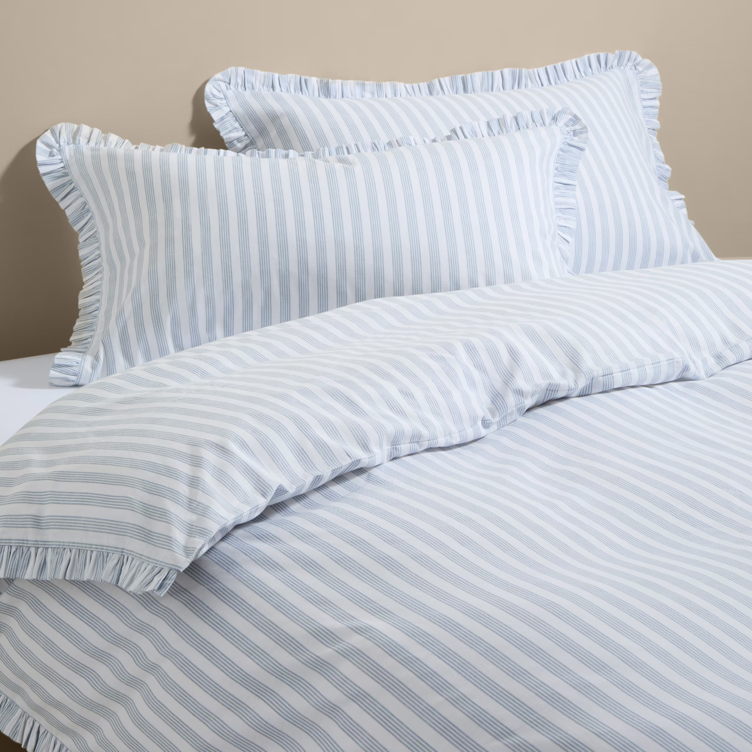blue and white stripe bedding with ruffle edges