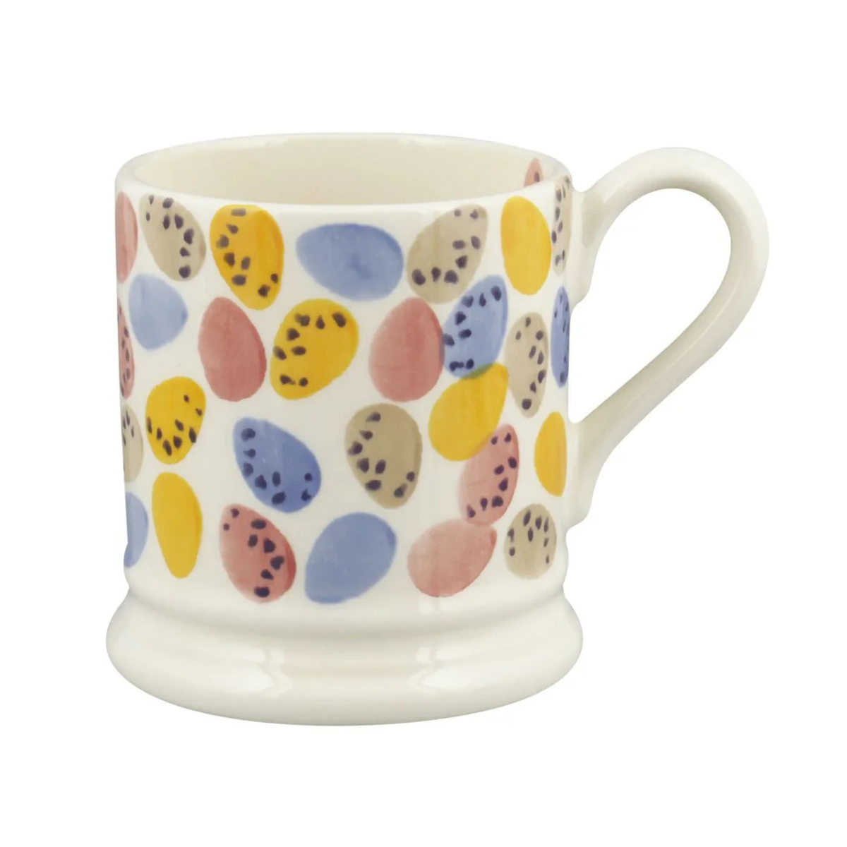 a white mug with mini eggs pattern
