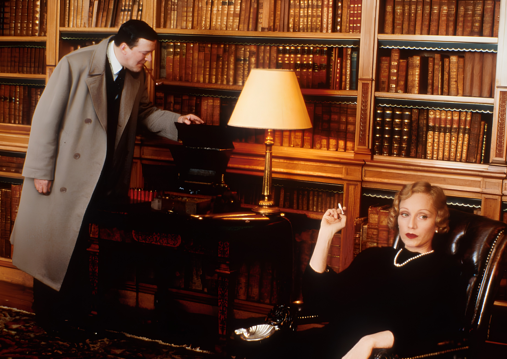a scene in the library room from gosford park 2001