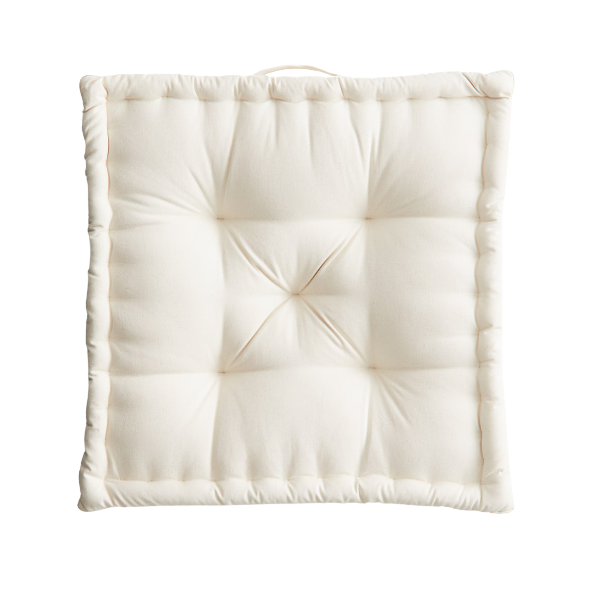 AN OFF WHITE FLOOR CUSHION