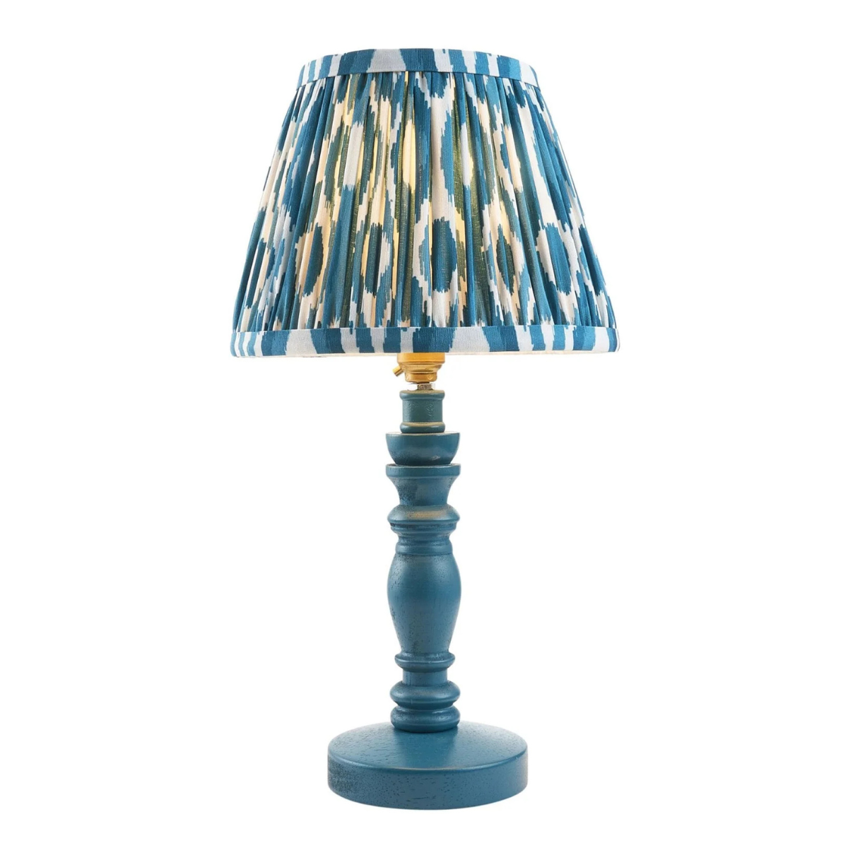 a blue lamp base with a blue and white ikat pleated shade