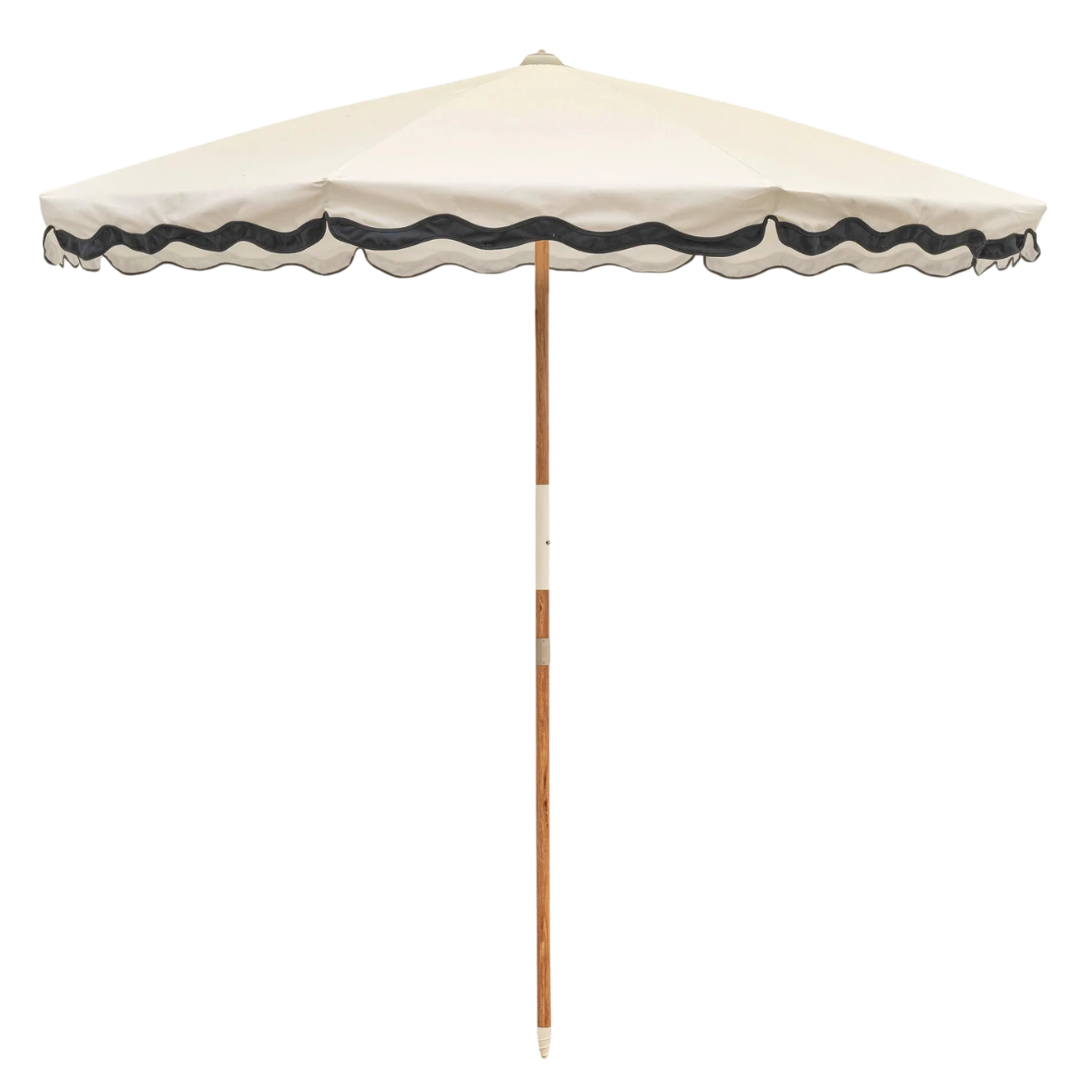 a white parasol with black scalloped trim