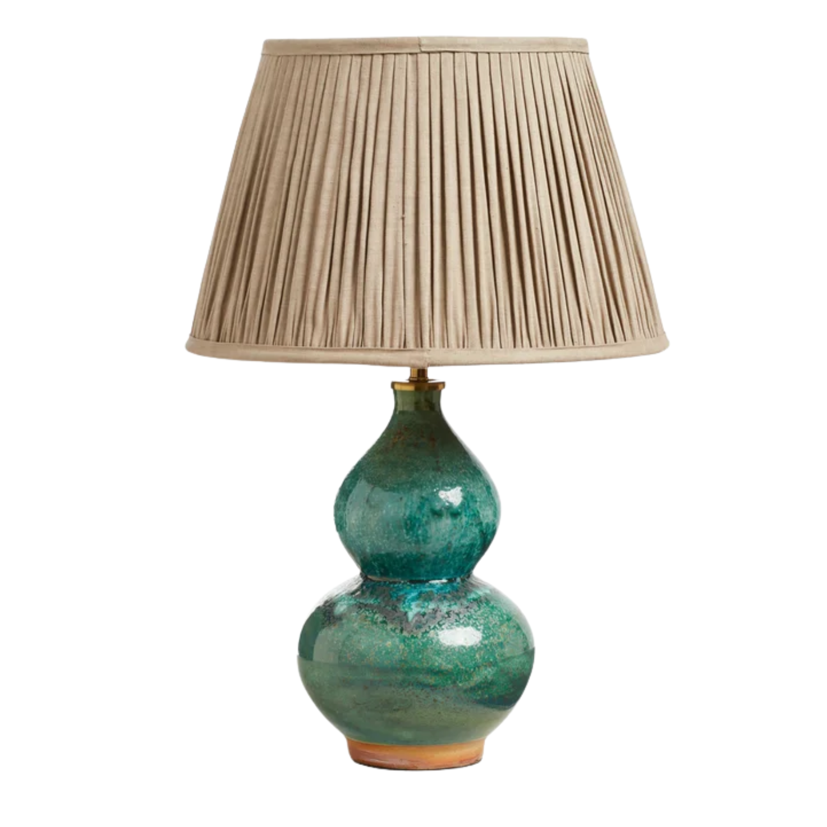 a teal green lamp with a beige pleated lampshade