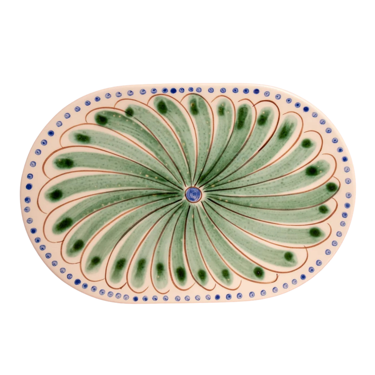 an oval serving plate with a green flower illustration and a blue polka dot rim