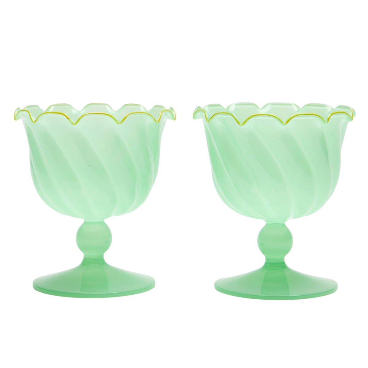 a set of two green glass ice cream bowls with a stem and swirl scalloped detail